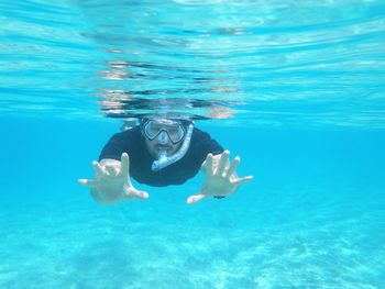 Portrait of man snorkeling underwater