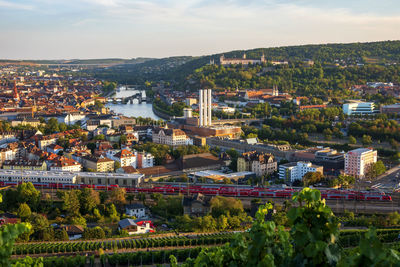 Train station by vineyard with marienberg fortress in background, wurzburg, germany