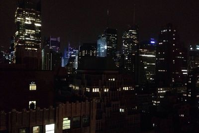 Illuminated cityscape at night