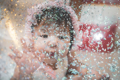 Full frame shot of wet glass window