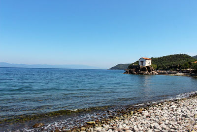 Scenic view of sea against clear sky