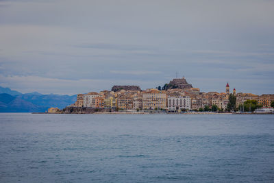 Panorama of the city of corfu with venetian fortress on a rainy day, greece