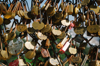 Close-up of padlocks hanging on metal