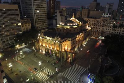 High angle view of city buildings at night