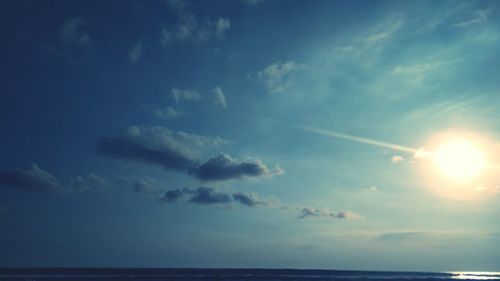 Scenic view of sea against blue sky