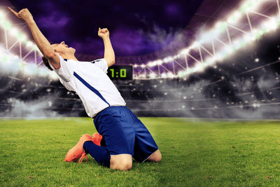 Low angle view of soccer ball on field