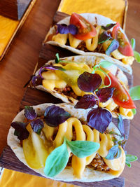 High angle view of fruits in plate on table