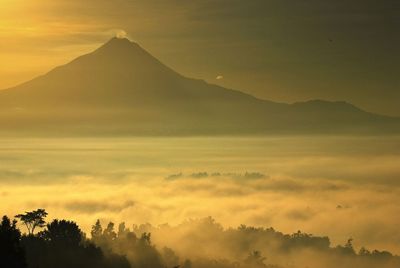 Scenic view of mountains at sunset