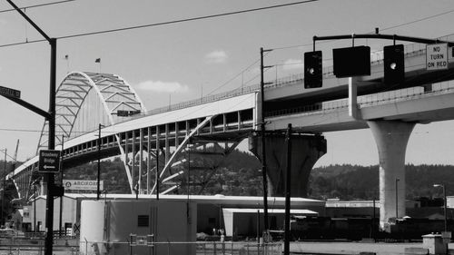 Low angle view of elevated road against sky