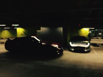 Cars in parking lot at night