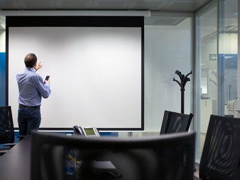 Men working in office