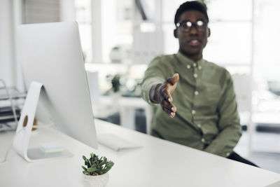 Young man using laptop on table