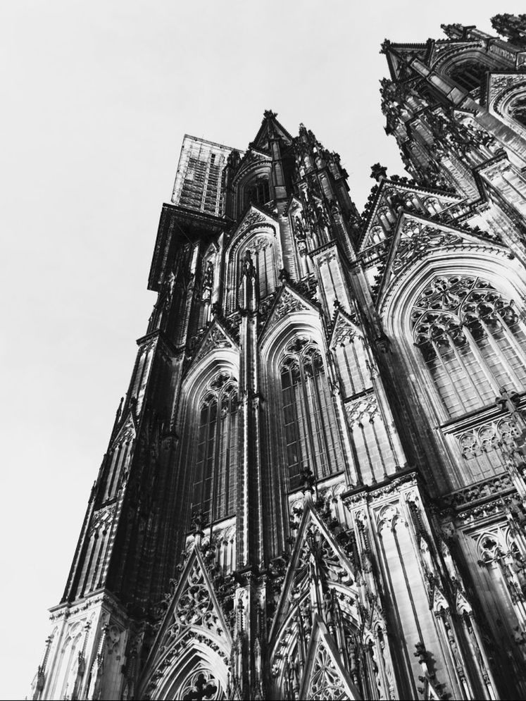 low angle view, architecture, building exterior, built structure, religion, church, place of worship, spirituality, sky, clear sky, window, high section, cathedral, no people, day, outdoors, building, history