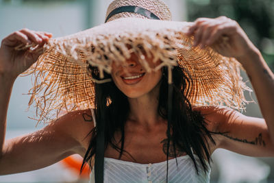 Portrait of woman wearing hat