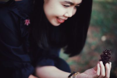 Close-up of woman holding hands