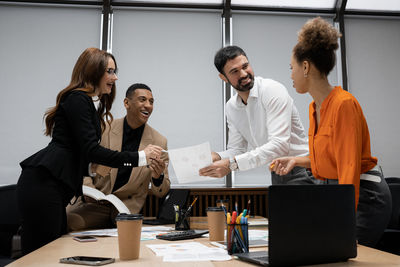 Business colleagues working at office