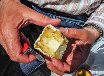 Close-up of man preparing food