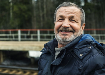 Close-up of portrait of smiling senior man