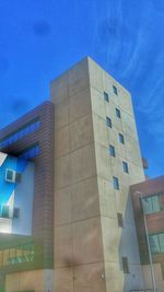 Low angle view of modern building against clear sky