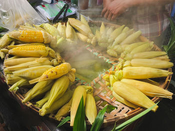 Close-up of boiled corn for sale at market stall