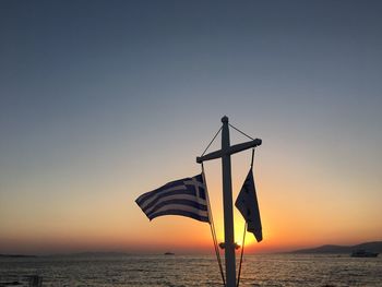 Scenic view of sea against clear sky during sunset