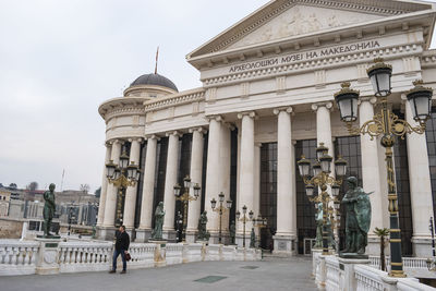 Facade of historic building against sky