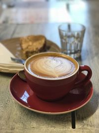 Close-up of cappuccino on table