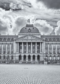 Building against cloudy sky