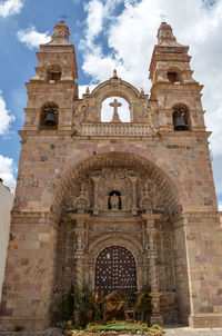 Low angle view of church against sky
