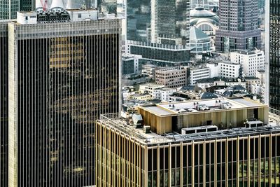 High angle view of modern buildings in city