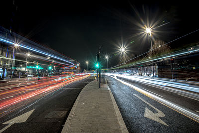 Light trails on city street at night