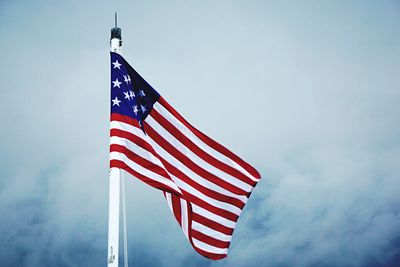 Low angle view of flag against sky