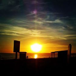 Scenic view of sea at sunset