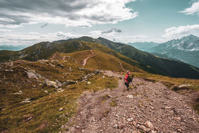 Full length of person on mountains against sky