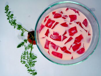 High angle view of red fruit on table