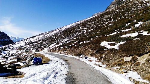 Snow covered mountain against sky