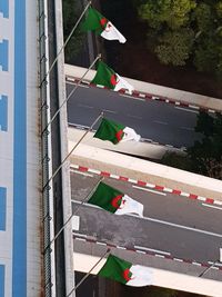 High angle view of flag on road amidst trees