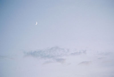 Low angle view of moon in sky