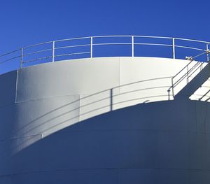 Low angle view of staircase against clear blue sky