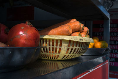 Close-up of fruits and vegetables on shelf