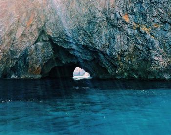 Rock formation on blue sea