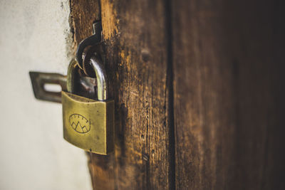 Close-up of padlock on door