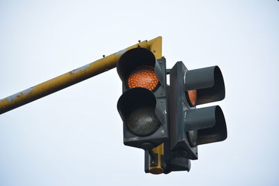 Low angle view of road signal