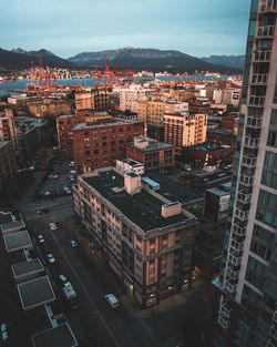 High angle view of street amidst buildings in city
