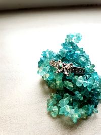 High angle view of wedding rings on table