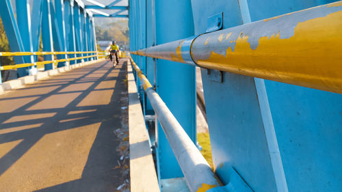 Rear view of man on bridge