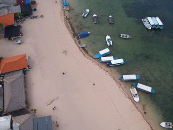 High angle view of boats moored on beach