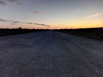 Surface level of country road at sunset