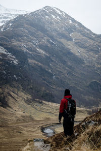 Tourists hiking on mountain