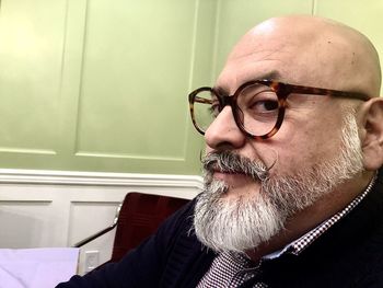 Portrait of man wearing eyeglasses